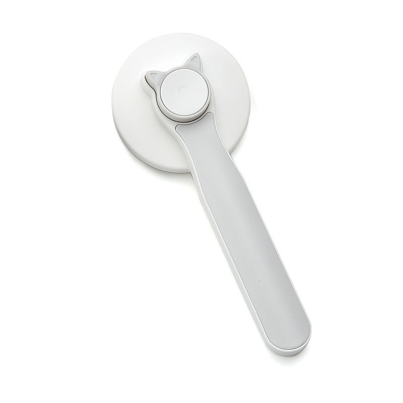 Gray self-cleaning pet grooming brush